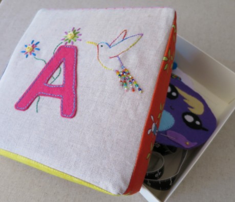 Box covers decorated with initials and patchwork sides